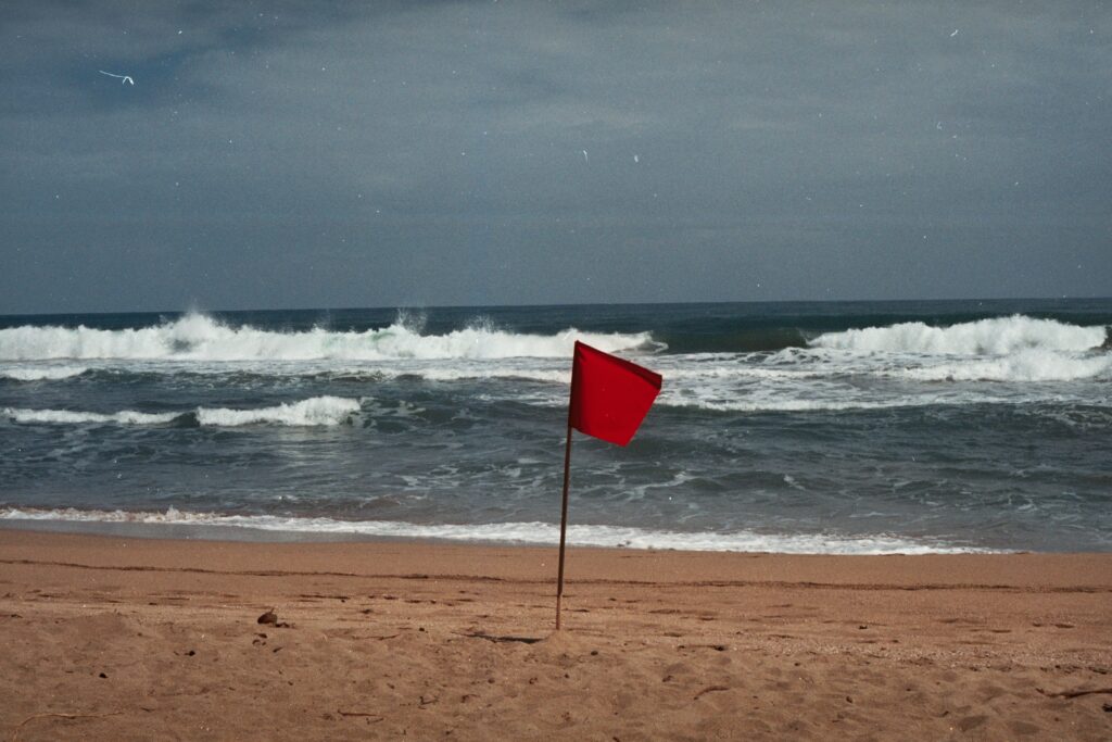 Red flag on a beach